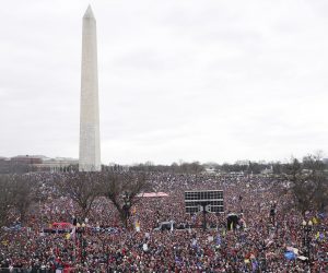epa08923089 Supporters as US President Donald J. Trump delivers remarks to supporters gathered to protest Congress' upcoming certification of Joe Biden as the next president on the Ellipse in Washington, DC, USA, 06 January 2021. Various groups of Trump supporters are gathering to protest as Congress prepares to meet and certify the results of the 2020 US Presidential election.  EPA/SHAWN THEW