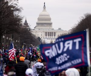 epa08923287 Pro-Trump protesters march down Pennsylvania Avenue to the US Capitol (seen behind) in Washington, DC, USA, 06 January 2021. Right-wing conservative groups are protesting against Congress counting the electoral college votes. Dozens of state and federal judges have shot down challenges to the 2020 presidential election, finding the accusations of fraud to be without merit.  EPA/MICHAEL REYNOLDS