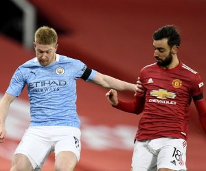 epa08923345 Bruno Fernandes of Manchester United (R) in action against Kevin de Bruyne of Manchester City (L) during the English Carabao Cup semi final soccer match between Manchester United vs Manchester City in Manchester, Britain, 06 January 2021.  EPA/Peter Powell / POOL EDITORIAL USE ONLY. No use with unauthorized audio, video, data, fixture lists, club/league logos or 'live' services. Online in-match use limited to 120 images, no video emulation. No use in betting, games or single club/league/player publications.