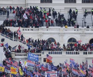epa08923480 Pro-Trump protesters occupy the grounds of the West Front of the US Capitol, including the inaugural stage and viewing stands, in Washington, DC, USA, 06 January 2021. Protesters stormed the US Capitol where the Electoral College vote certification for President-elect Joe Biden took place.  EPA/MICHAEL REYNOLDS