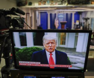 epa08923570 US President Donald J. Trump is seen delivering remarks via Twitter about the violence at the US Capitol on a television screen in the Brady press briefing room at the White House in Washington, DC, USA, 06 January 2021. Various groups of Trump supporters have broken into the US Capitol and rioted as Congress prepares to meet and certify the results of the 2020 US Presidential election.  EPA/SHAWN THEW
