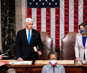 epa08924040 US Vice President Mike Pence (L, top) and House Speaker Nancy Pelosi (R, top) preside over a joint session of Congress to certify the 2020 Electoral College results after supporters of President Donald Trump stormed the Capitol earlier in the day on Capitol Hill in Washington, DC, 06 January 2021.  EPA/Erin Schaff / POOL