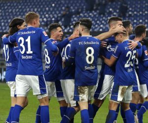 epa08928691 Matthew Hoppe (3-R) of FC Schalke 04 celebrates with teammates after scoring their team's third goal  during the Bundesliga match between FC Schalke 04 and TSG Hoffenheim at Veltins-Arena in Gelsenkirchen, Germany, 09 January 2021.  EPA/LARS BARON / POOL DFL regulations prohibit any use of photographs as image sequences and/or quasi-video.