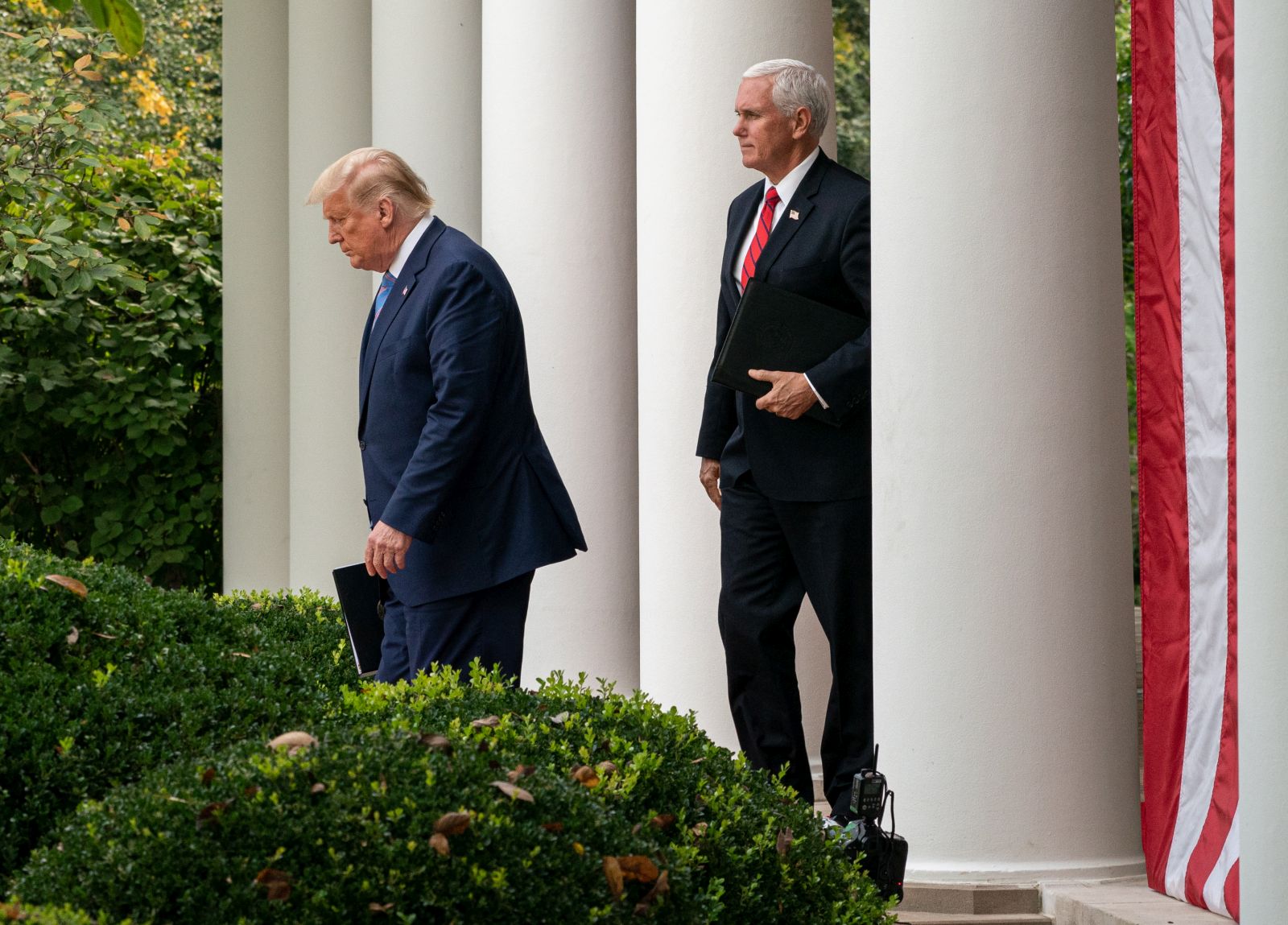 epa08931191 (FILE) - US President Donald J. Trump (L) and Vice President Mike Pence arrive to give an update on the Nation's Coronavirus Testing Strategy, in the Rose Garden of the White House, in Washington, DC, USA, 28 September 2020 (reissued 11 January 2021). According to reports on 11 January 2021, US House Speaker Nancy Pelosi urged US Vice President Mike Pence to oust US President Trump by invoking the 25th amendment, or said the Democrats would move forward with an impeachment.  EPA/Ken Cedeno / POOL *** Local Caption *** 56378934