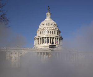 epa08933146 The US Capitol is seen behind steam in Washington, DC, USA, 12 January 2021. At least ten thousand troops of the National Guard will be deployed in Washington by the end of the week, with the possibility of five thousand more, to help secure the Capitol area ahead of more potentially violent unrest in the days leading up to the Inauguration of US President-elect Biden. Democrats are attempting to impeach incumbent US President Trump after he incited a mob of his supporters to riot on the US Capitol in an attempt to thwart Congress from certifying Biden's election victory.  EPA/MICHAEL REYNOLDS