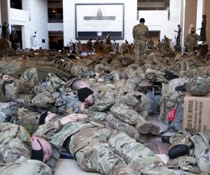 epa08935266 Hundreds of US National Guard troops rest in the Capitol Visitors Center on Capitol Hill in Washington, DC, USA, 13 January 2021. At least ten thousand troops of the National Guard will be deployed in Washington by the end of the week, with the possibility of five thousand more, to help secure the Capitol area ahead of more potentially violent unrest in the days leading up to the Inauguration of US President-elect Joe Biden. Democrats are attempting to impeach US President Donald J. Trump after he incited a mob of his supporters to riot on the US Capitol in an attempt to thwart Congress from certifying Biden's election victory.  EPA/MICHAEL REYNOLDS