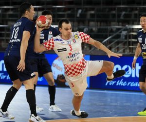 epa08939896 A handout photo made available by Egypt Handball 2021 of Mario Maric (C) of Croatia in action during the match between Croatia and Japan at the 27th Men's Handball World Championship in Alexandria, Egypt, 15 January 2021.  EPA/Hazem Gouda / Egypt Handball 2021 HANDOUT  SHUTTERSTOCK OUT HANDOUT EDITORIAL USE ONLY/NO SALES