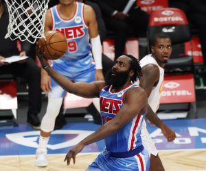 epa08942920 Brooklyn Nets guard James Harden (C) puts up a shot past the Orlando Magic defense during the second half of the NBA game between the Orlando Magic and the Brooklyn Nets at the Barclays Center in Brooklyn, New York, USA, 16 January 2021.  EPA/JASON SZENES SHUTTERSTOCK OUT