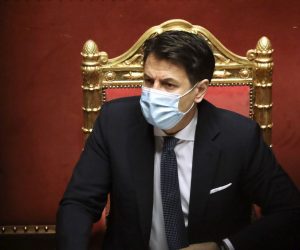 epa08949115 Giuseppe Conte, Italy's prime minister, listens during a debate in the Senate in Rome, Italy, 19 January 2021. Following the resignation of two ministers in Italian Prime Minister Conte's coalition government over a dispute on spending of EU funds during the pandemic, the Italian government is on the verge of another crisis.  EPA/Alessia Pierdomenico / POOL