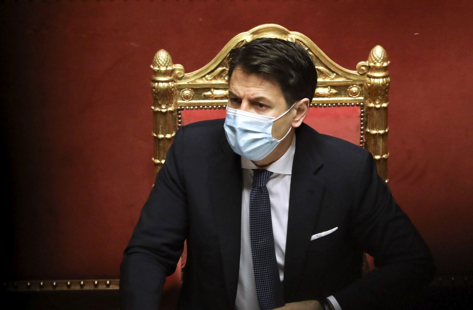 epa08949115 Giuseppe Conte, Italy's prime minister, listens during a debate in the Senate in Rome, Italy, 19 January 2021. Following the resignation of two ministers in Italian Prime Minister Conte's coalition government over a dispute on spending of EU funds during the pandemic, the Italian government is on the verge of another crisis.  EPA/Alessia Pierdomenico / POOL