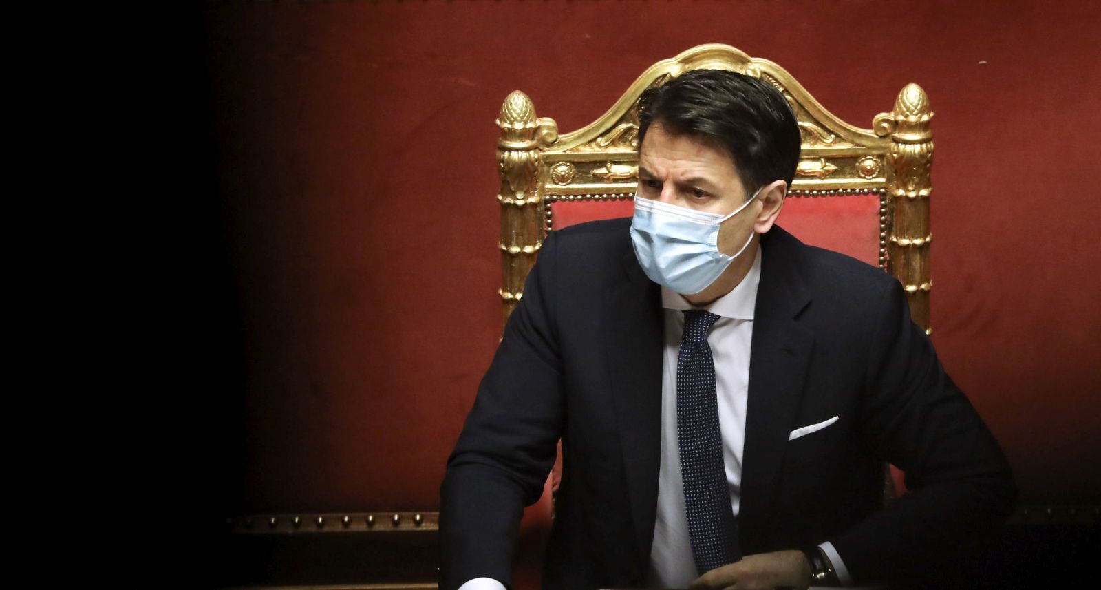 epa08949115 Giuseppe Conte, Italy's prime minister, listens during a debate in the Senate in Rome, Italy, 19 January 2021. Following the resignation of two ministers in Italian Prime Minister Conte's coalition government over a dispute on spending of EU funds during the pandemic, the Italian government is on the verge of another crisis.  EPA/Alessia Pierdomenico / POOL