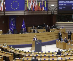 epa08950762 European Commission President Ursula von der Leyen (C, standing) speaks during a debate on the inauguration of the new President of the United States and the current political situation, during a plenary session of the European Parliament, in Brussels, Belgium, 20 January 2021.  EPA/OLIVIER HOSLET