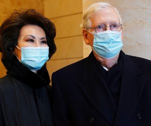 epa08951870 Senate Majority Leader Mitch McConnell (R) and former Secretary of Transportation Elaine Chao (L) before President-elect Joe Biden arrives at the East Front of the US Capitol for his inauguration ceremony to be the 46th President of the United States in Washington, DC, USA, 20 January 2021. Biden won the 03 November 2020 election to become the 46th President of the United States of America.  EPA/JIM LO SCALZO / POOL