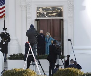 epa08954154 US President Joe Biden and First Lady Dr. Jill Biden pose as they prepare to enter the White House following the inauguration ceremony on the West Front of the US Capitol in Washington, DC, USA, 20 January 2021. Biden won the 03 November 2020 election to become the 46th President of the United States of America.  EPA/SHAWN THEW