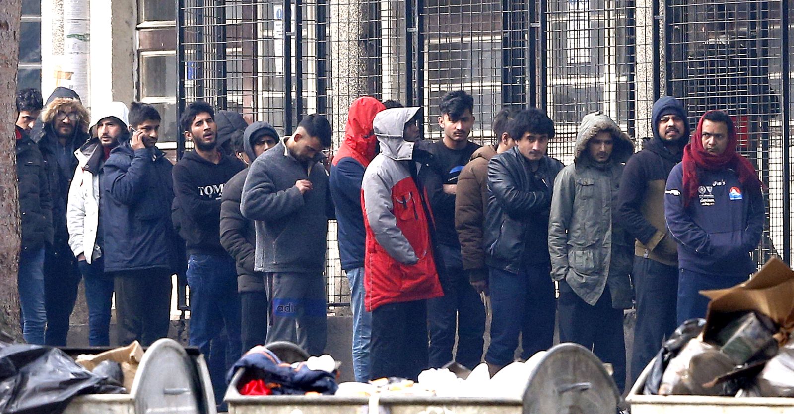 epa08955538 Migrants at the former military barracks in Blazuj, a suburb of Sarajevo, Bosnia and Herzegovina, 21 January 2021. According to the latest official data, there are currently more than 6,000 migrants in Bosnia and Herzegovina, who entered illegally in an attempt to reach some of the countries of Western Europe, mostly Germany, Italy and Austria.  EPA/FEHIM DEMIR