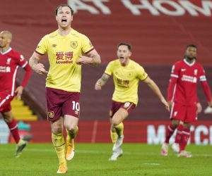 epa08956612 Ashley Barnes of Burnley celebrates scoring his team's opening goal from the penalty spot during the English Premier League soccer match between Liverpool FC and Burnley FC in Liverpool, Britain, 21 January 2021.  EPA/Jon Super / POOL EDITORIAL USE ONLY. No use with unauthorized audio, video, data, fixture lists, club/league logos or 'live' services. Online in-match use limited to 120 images, no video emulation. No use in betting, games or single club/league/player publications.