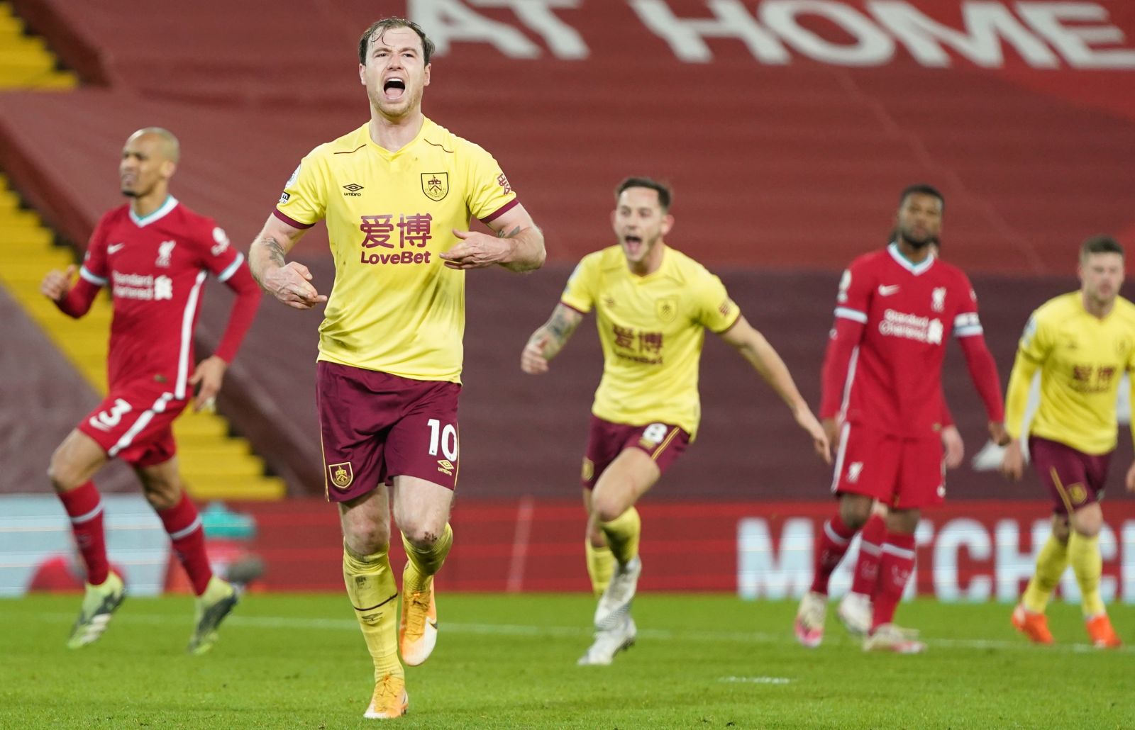 epa08956612 Ashley Barnes of Burnley celebrates scoring his team's opening goal from the penalty spot during the English Premier League soccer match between Liverpool FC and Burnley FC in Liverpool, Britain, 21 January 2021.  EPA/Jon Super / POOL EDITORIAL USE ONLY. No use with unauthorized audio, video, data, fixture lists, club/league logos or 'live' services. Online in-match use limited to 120 images, no video emulation. No use in betting, games or single club/league/player publications.