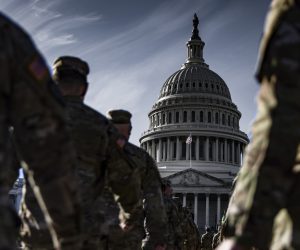 epa08958805 Members of the New York National Guard  march in formation on the east front of the US Capitol building on Capitol Hill in Washington, DC, USA, 22 January 2021. Approximately 25,000 National Guard troops from all over the country were activated in order to protect the US Capitol and other locations in Washington following the January 6th attack on the Capitol by a pro-Trump mob.  EPA/SAMUEL CORUM