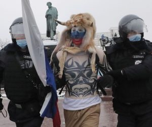 epaselect epa08960418 Russian special police units officers detain a protester during an unauthorized protest in support of Russian opposition leader and blogger Alexei Navalny, in Moscow, Russia, 23 January 2021. Navalny was detained after his arrival to Moscow from Germany on 17 January 2021. A Moscow judge on 18 January ruled that he will remain in custody for 30 days following his airport arrest. Navalny urged Russians to take to the streets to protest. In many Russian cities mass events are prohibited due to an increasing number of cases of the COVID-19 pandemic caused by the SARS CoV-2 coronavirus.  EPA/MAXIM SHIPENKOV