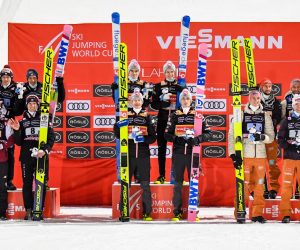 epa08960653 Second placed Team of Poland (L), winner team of Norway (C) and third placed team of Germany (R) celebrate on the podium for  the Men's Large Hill Team competition at the FIS Ski Jumping World Cup in Lahti, Finland, 23 January 2021.  EPA/KIMMO BRANDT