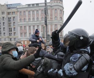 epa08960712 Russian special police units officers clash with protesters during an unauthorized protest in support of Russian opposition leader and blogger Alexei Navalny, in Moscow, Russia, 23 January 2021. Navalny was detained after his arrival to Moscow from Germany on 17 January 2021. A Moscow judge on 18 January ruled that he will remain in custody for 30 days following his airport arrest. Navalny urged Russians to take to the streets to protest. In many Russian cities mass events are prohibited due to an increasing number of cases of the COVID-19 pandemic caused by the SARS CoV-2 coronavirus.  EPA/MAXIM SHIPENKOV