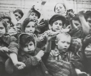 epa08966064 A handout photo made available by the Auschwitz Memorial and Museum shows the children in the Auschwitz-Birkenau concentration camp in Oswiecim showing their tatooed numbers on their arms after the liberation at the former German Nazi concentration and extermination camp Auschwitz-Birkenau in Oswiecim, Poland, January 1945 (reissued 26 January 2021). The 76th anniversary of the liberation of the largest German Nazi concentration and death camp on 27 January 1945, will be commemorated online due to the coronavirus Covid-19 pandemic, with online broadcast and discussion panels focused on the fate of children in Auschwitz. The liberation of the Auschwitz-Birkenau is commemorated as International Holocaust Remembrance Day worldwide. The biggest German Nazi death camp KL Auschwitz-Birkenau was a complex of over 40 concentration and extermination camps operated by Nazi Germany near Oswiecim in occupied Poland during World War II, and a central site in the Nazis' plan to the so-called 'Final Solution' and the Holocaust (Shoa). It is estimated that 1.3 million people were sent to Auschwitz, and 1.1 million died there including 960,000 Jews, 74,000 non-Jewish Poles, 21,000 Roma people, 15,000 Soviet prisoners of war, and up to 15,000 other Europeans. Prisoners who were not gassed in chambers died of starvation, exhaustion, disease, individual executions, beatings or were killed during medical experiments. According to data from Auschwitz memorial,  at least 232,000 children and young people were deported to Auschwitz, of whom 216,000 were Jews, 11,000 Roma, about 3,000 Poles, more than 1,000 Belarusians, and several hundred Russians, Ukrainians, and others. A total of about 23,000 children and young people were registered in the camp. Slightly more than 700 were liberated on the territory of Auschwitz in January 1945.  EPA/www.auschwitz.org / HANDOUT  HANDOUT EDITORIAL USE ONLY/NO SALES *** Local Caption *** 55790113