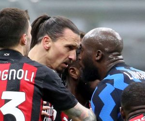 epa08967386 AC Milan's Zlatan Ibrahimovic (L) and Inter Milan's Romelu Lukaku react during the Italian cup quarter-final soccer match between FC Inter and AC Milan at Giuseppe Meazza stadium in Milan, Italy, 26 January 2021.  EPA/MATTEO BAZZI