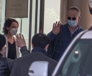 epa08970389 Members of World Health Organization (WHO) team leave the Jade Boutique hotel after the mandatory 14-day quarantine, in Wuhan, China, 28 January 2021. The international expert team from the World Health Organization (WHO) concluded their 14-day quarantine on 28 January in Wuhan and will begin to investigate the origin of COVID-19.  EPA/ROMAN PILIPEY