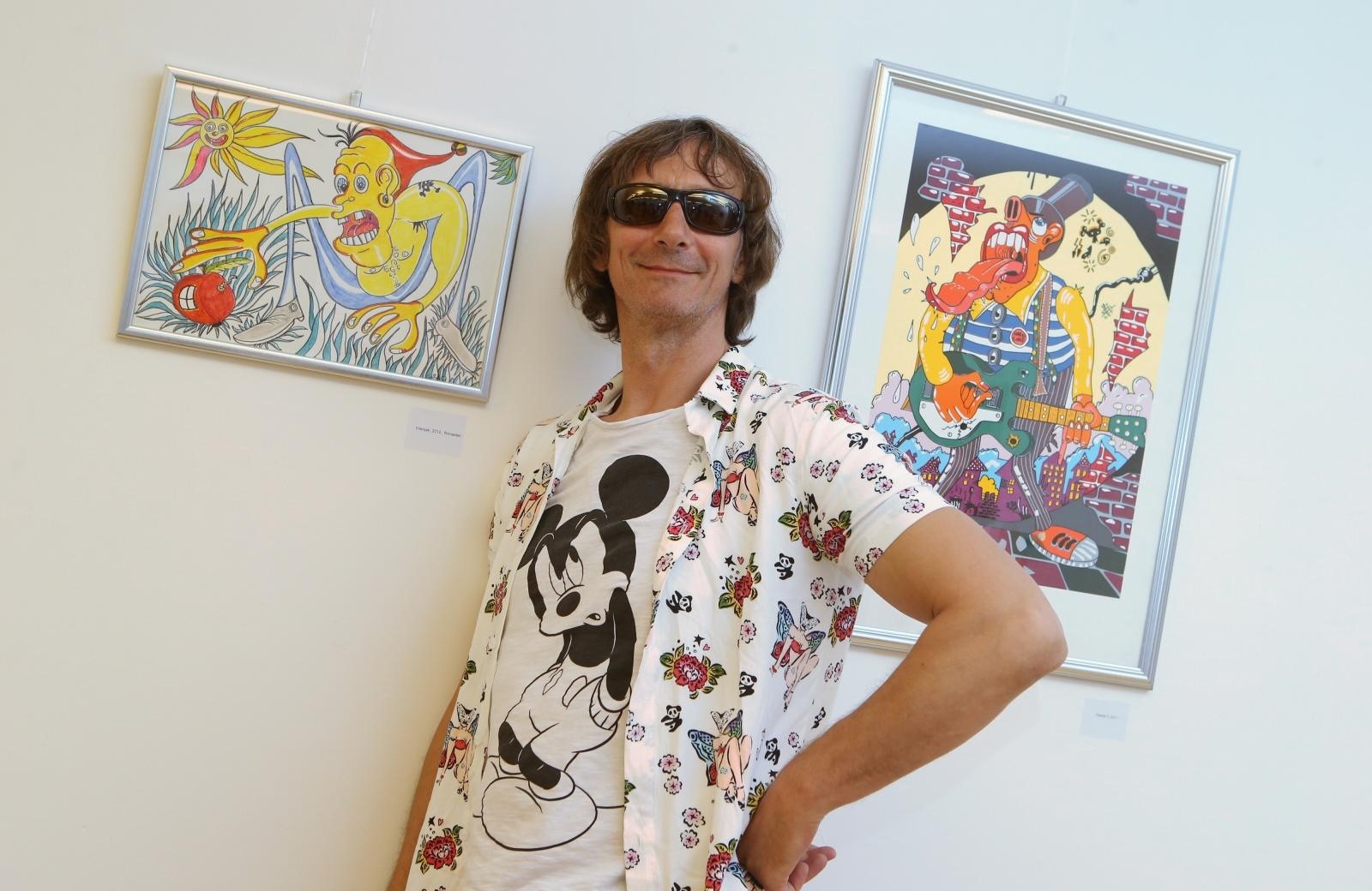 Split: Gobac u majici na Mickeyja otvorio svoju izložbu Volim crtane filmove 09.07.2018., Split - U Sveucilisnoj galeriji Vasko Lipovac otvorena je samostalna izlozba Davora Gopca Volim crtane filmove. 

Photo: Ivo Cagalj/PIXSELL