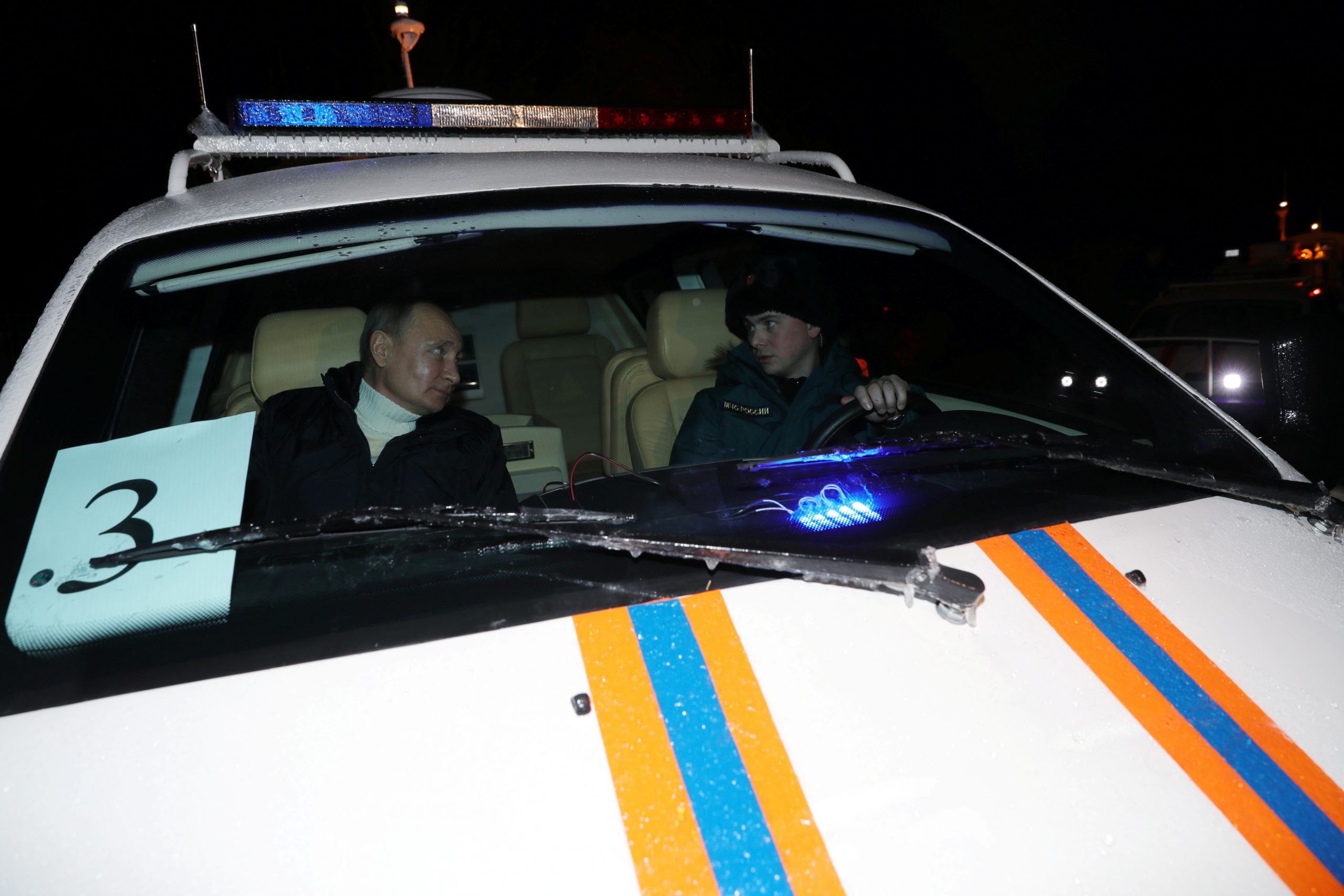 Russian President Putin attends the Orthodox Christmas service outside Veliky Novgorod Russian President Vladimir Putin arrives for the Orthodox Christmas service at the Saint Nikolai Church on Lipno Island in the Msta River delta outside Veliky Novgorod, Russia January 6, 2021. Picture taken January 6, 2021. Sputnik/Mikhail Klimentyev/Kremlin via REUTERS ATTENTION EDITORS - THIS IMAGE WAS PROVIDED BY A THIRD PARTY. SPUTNIK