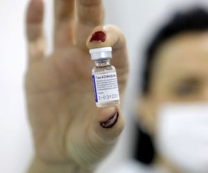 epa08981473 (FILE) - A medical worker shows a dose of Russia's Sputnik V Gam-COVID-Vac vaccine against the COVID-19 to a patient during the vaccination at Belgrade Fair makeshift vaccination center in Belgrade, Serbia, 01 February 2021 (reissued 02 Februiary 2021). Results of a study published in The Lancet on 02 February 2021 say that the Russian Covid-19 vaccine Sputnik V has an efficacy of 91.6 percent. The vaccine had been rolled out by Russia before Phase 3 trials were finished.  EPA/MARKO DJOKOVIC