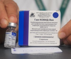 epa08981472 (FILE) - A nurse shows the vaccine against Covid-19 to apply it to doctors and health workers, after the arrival of the first 20,000 doses of the Russian Sputnik V, at the Japanese Hospital of Santa Cruz, Bolivia, 29 January 2021 (reissued 02 February 2021). Results of a study published in The Lancet on 02 February 2021 say that the Russian Covid-19 vaccine Sputnik V has an efficacy of 91.6 percent. The vaccine had been rolled out by Russia before Phase 3 trials were finished.  EPA/JUAN CARLOS TORREJON
