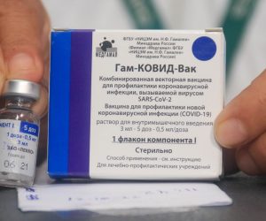 epa08981472 (FILE) - A nurse shows the vaccine against Covid-19 to apply it to doctors and health workers, after the arrival of the first 20,000 doses of the Russian Sputnik V, at the Japanese Hospital of Santa Cruz, Bolivia, 29 January 2021 (reissued 02 February 2021). Results of a study published in The Lancet on 02 February 2021 say that the Russian Covid-19 vaccine Sputnik V has an efficacy of 91.6 percent. The vaccine had been rolled out by Russia before Phase 3 trials were finished.  EPA/JUAN CARLOS TORREJON