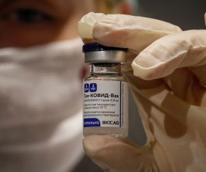 epa08981471 (FILE) - Russian medic holds Russia's Sputnik V Gam-COVID-Vac vaccine at the vaccination point at the State Department Store GUM in Moscow, Russia 19 January 2021 (reissued 02 February 2021). Results of a study published in The Lancet on 02 February 2021 say that the Russian Covid-19 vaccine Sputnik V has an efficacy of 91.6 percent. The vaccine had been rolled out by Russia before Phase 3 trials were finished.  EPA/YURI KOCHETKOV