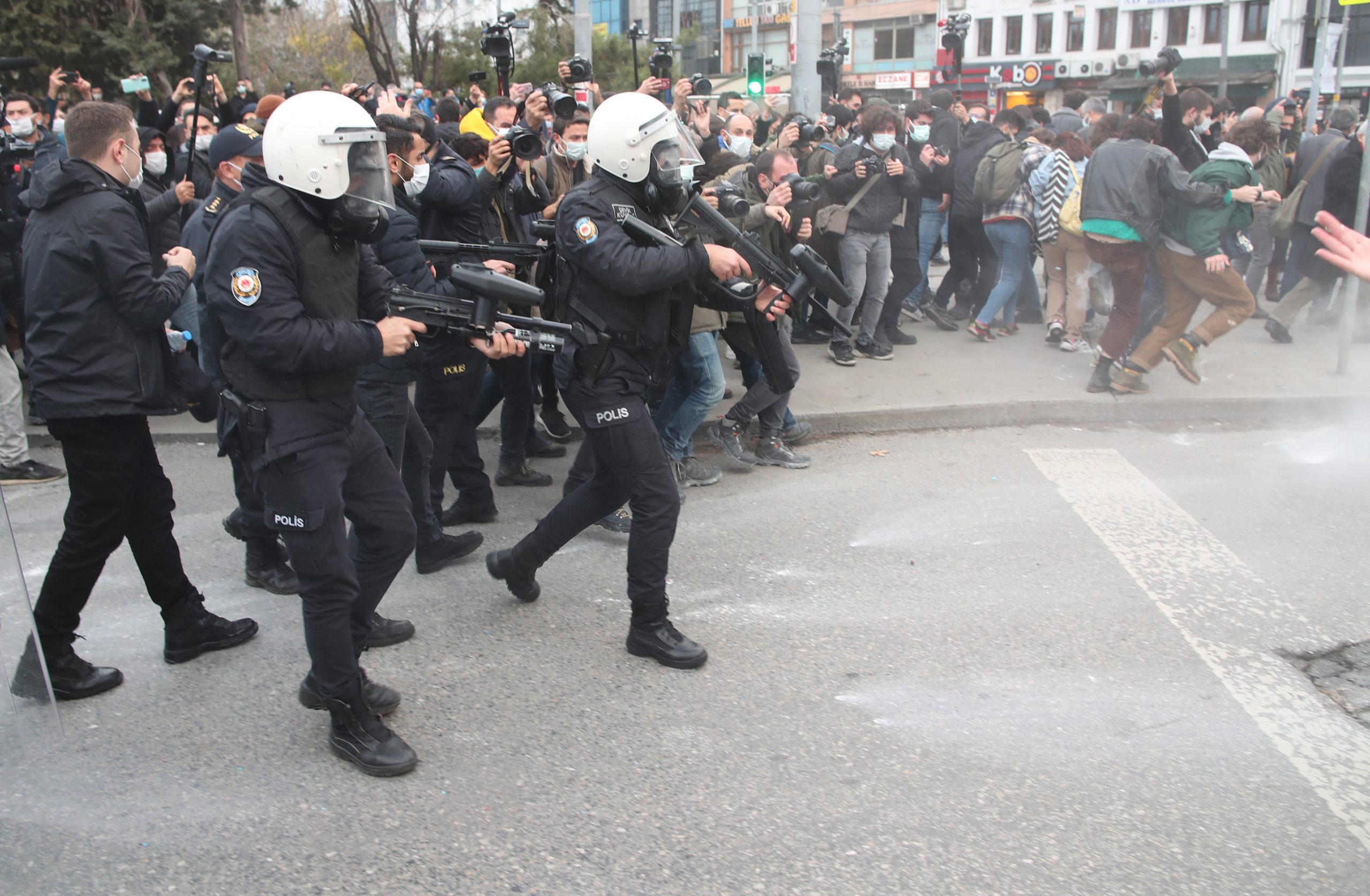 epa08981676 Turkish riot police use plastic bullets for block the people as they secure the area during a protest against Turkish President Erdogan's appointed rector at the Bogazici University in Istanbul, Turkey, 02 February 2021.Turkish President Recep Tayyip Erdogan appointed a controversial party member as rector of Turkey's highly prestigious Bogazici University. Teachers and students at the Turkish school condemned the new rector's appointment as an undemocratic move, media reported. Bogazici University, overlooking the Bosphorus, was founded in 1863 and it has more than 15,000 students and six campuses on the European side of Istanbul.  EPA/TOLGA BOZOGLU