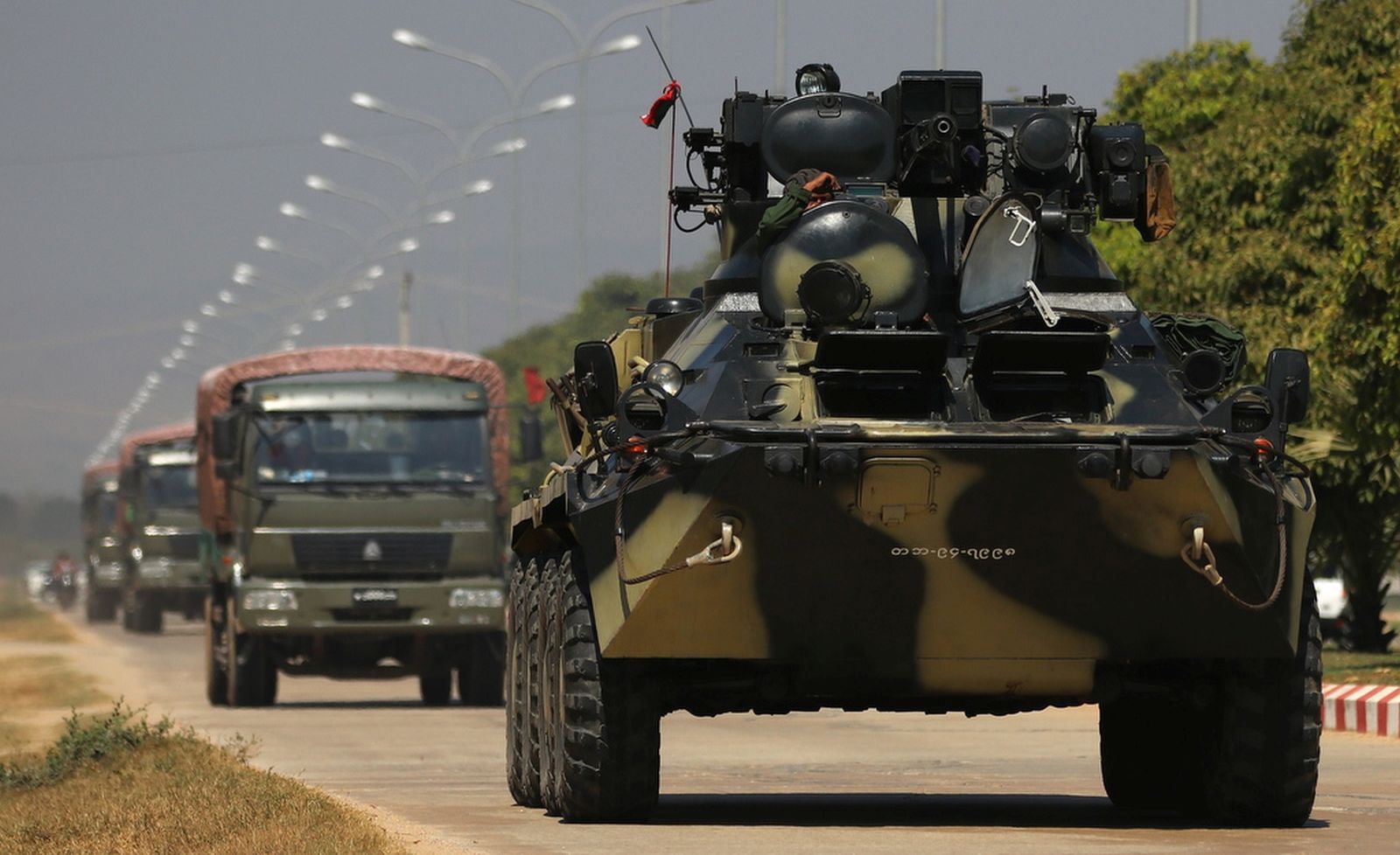 epa08983738 Military vehicles and soldiers patrol a road in Naypyitaw, Myanmar, 03 February 2021. Myanmar's military seized power and declared a state of emergency for one year after arresting State Counselor Aung San Suu Kyi and Myanmar president Win Myint in an early morning raid on 01 February, following increasing tension over the result of last November's parliamentary elections.  EPA/MAUNG LONLAN