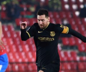 epa08985553 Barcelona's striker Leo Messi in action during the Spanish King's Cup quarter finals soccer match between Granada FC and FC Barcelona at Nuevo Los Carmenes stadium in Granada, Andalusia, Spain, 03 February 2021.  EPA/Pepe Torres