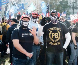epa08985259 (FILE) - Two people, one of them with a Proud Boys shirt, gesture with the White Power sign, as supporters of US President Donald J. Trump gather to support his legal challenges to the 2020 presidential election, in Freedom Plaza, in Washington, DC, USA, 14 November 2020 (reissued 03 February 2021). Canada has labbeled the Far-right group the Proud Boys a terrorist group, Canadian public safety minister Bill Blair announced on 03 February 2021.  EPA/GAMAL DIAB *** Local Caption *** 56499065