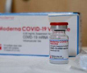 epa08988847 A view of a vial of COVID-19 vaccine manufactured by the US biotechnology company Moderna in the surgery of general practitioner Janos Plavecz in Tatabanya, Hungary, 05 February 2021. The nationwide inoculation of people in the oldest age group, who registered to receive a jab, was launched on 04 February 2021.  EPA/TAMAS VASVARI HUNGARY OUT