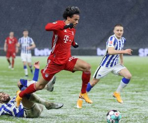 epa08990103 Matheus Cunha (L) of Berlin challenges Leroy Sane of Muenchen during the German Bundesliga soccer match between Hertha BSC and FC Bayern Munich at Olympiastadion in Berlin, Germany, 05 February 2021.  EPA/Boris Streubel / POOL DFL regulations prohibit any use of photographs as image sequences and/or quasi-video.