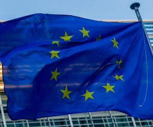 epa08999148 A European flag is seen in front of the European Commission in Brussels, Belgium, 09 February 2021.  EPA/STEPHANIE LECOCQ
