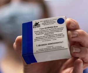 epa09006873 A box containing Russian vaccine Sputnik V is shown by a nurse at Central Hospital of the Hungarian Defence Forces (military) in Budapest, Hungary, 12 February 2021 as the vaccination with Sputnik V agains covid-19 begins in the country.  EPA/ZSOLT SZIGETVARY HUNGARY OUT