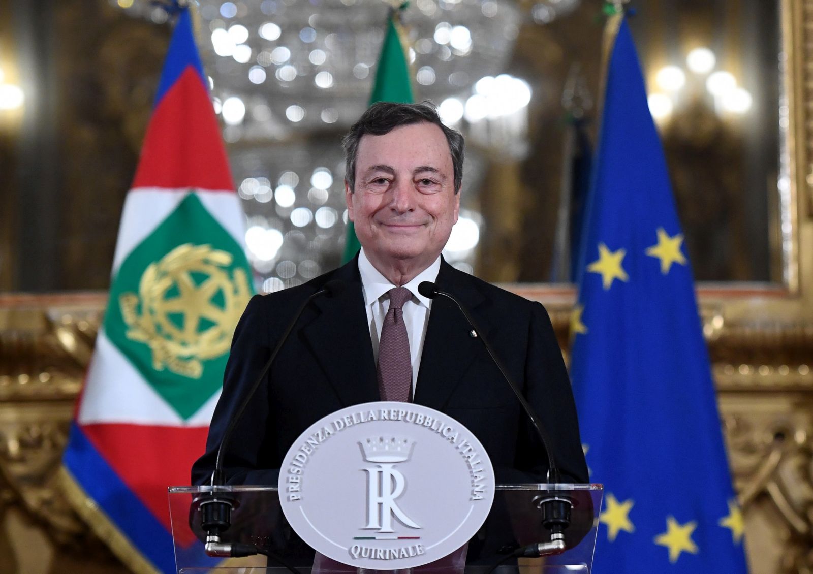 epa09007563 Italian Prime Minister-designate Mario Draghi addresses the media to announce his list of Ministers after a meeting with Italian President Mattarella, in Rome, Italy, 12 February 2021. Premier-designate Draghi has formally accepted to lead a government after meeting with President Mattarella. Mattarella gave Draghi a mandate to form a government after outgoing Premier Conte's collapsed  EPA/Alessandro Di Meo / POOL
