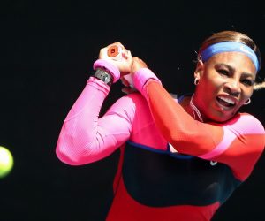 epa09011153 Serena Williams of the USA in action against Aryna Sabalenka of Belarus in their fourth round women's singles match of the Australian Open Grand Slam tennis tournament in Melbourne, Australia, 14 February 2021.  EPA/JASON O'BRIEN