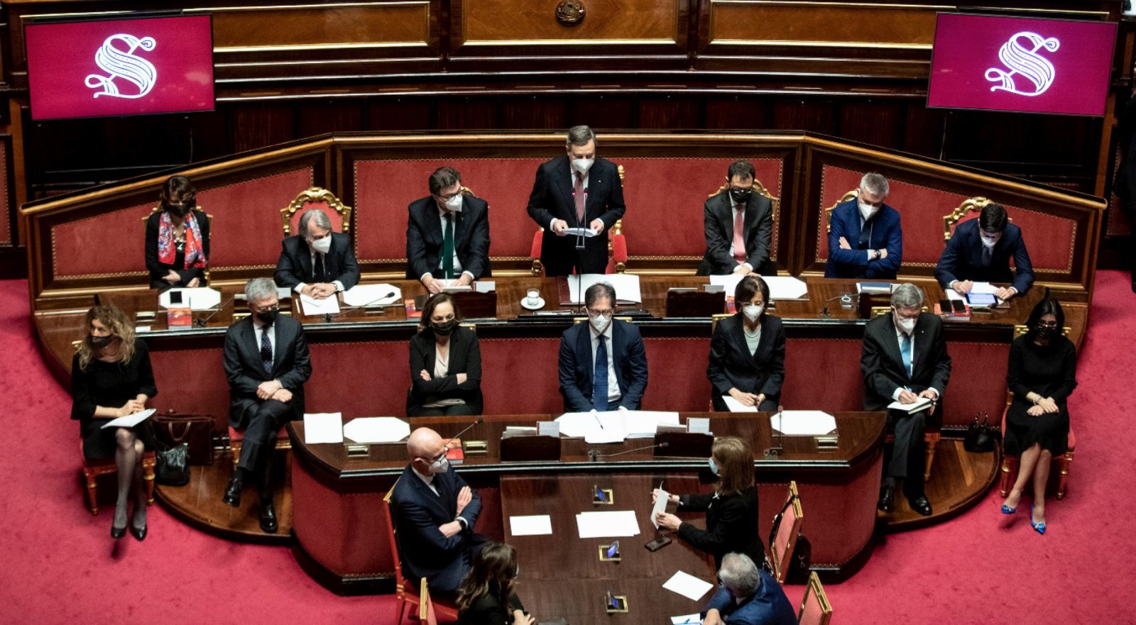 epa09017835 Italian premier Mario Draghi (C, second row) during his address to the Senate ahead of a confidence vote, in Rome, Italy, 17 February 2021. The new government will face vote of confidence in the Senate on 17 February and later another vote in the lower chamber on 18 February. Premier Mario Draghi and his new cabinet were sworn in before President Sergio Mattarella on 13 February 2021. The executive led by the former president of the European Central Bank is a sort of government of national unity assembled to prevent the country having to hold early elections in the middle of the COVID-19 pandemic following the collapse of ex-premier Giuseppe Conte's administration.  EPA/ROBERTO MONALDO / POOL  EPA-EFE/ROBERTO MONALDO / POOL
