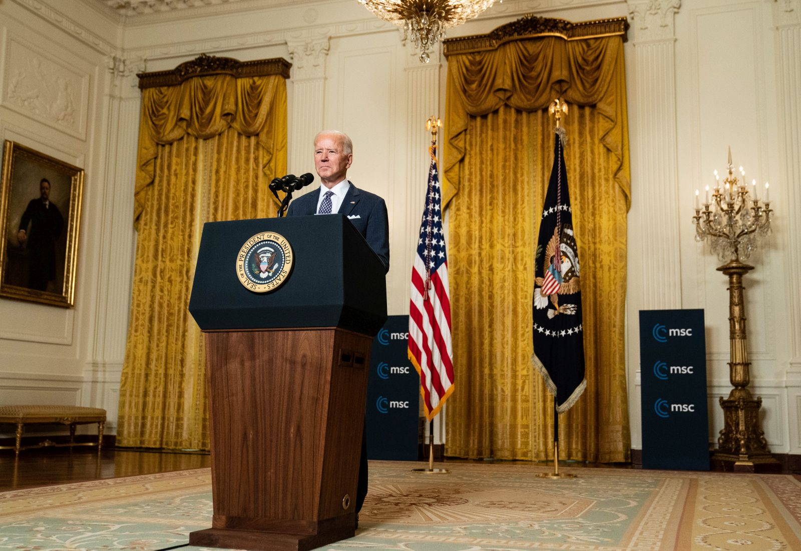 epa09024438 US President Joe Biden delivers remarks at a virtual event hosted by the Munich Security Conference in the East Room of the White House in Washington, DC, USA on 19 February 2021. In his remarks, President Biden stressed the United States' commitment to NATO after four years of the Trump administration undermining the alliance.  EPA/Anna Moneymaker / POOL