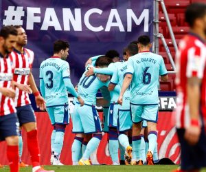 epa09026245 Levante players celebrate their 1-0 lead during the Spanish La Liga soccer match between Atletico Madrid and Levante UD in Madrid, Spain, 20 February 2021.  EPA/Chema Moya