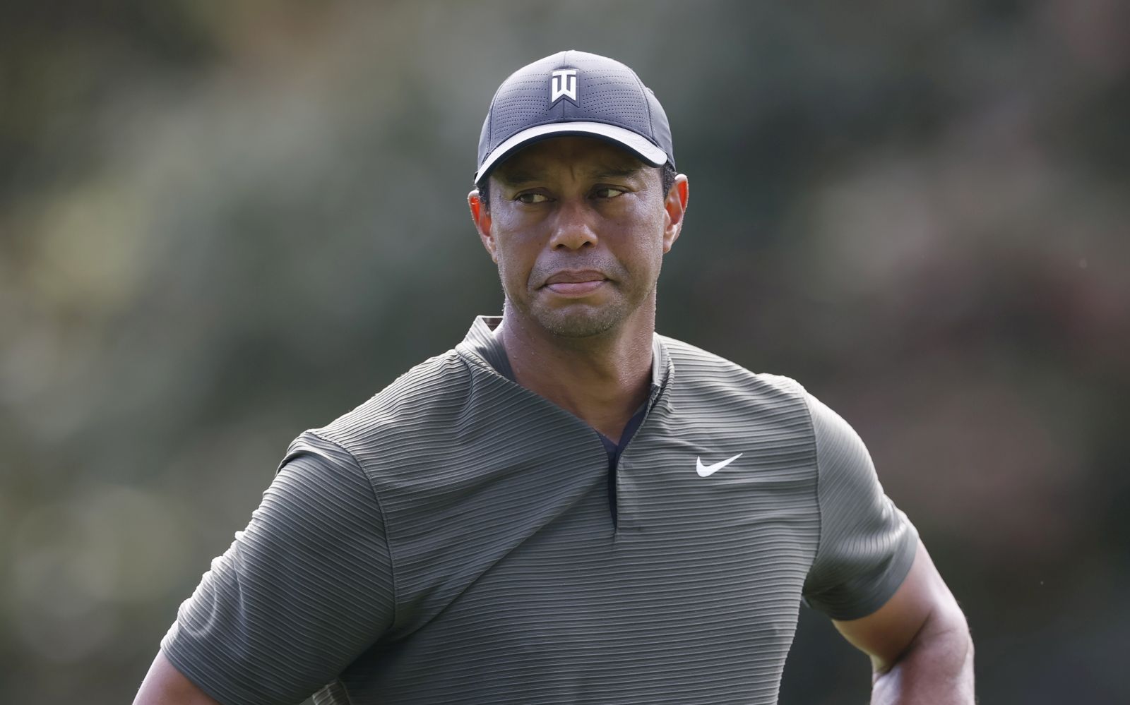epa09032342 (FILE) - Tiger Woods of the US on the fifteenth hole during the first round of the 2020 Masters Tournament at the Augusta National Golf Club in Augusta, Georgia, USA, 12 November 2020 (Reissued 23 February 2021). Tiger Woods was hospitalized following a car accident in LA Count on 23 February.  EPA/ERIK S. LESSER *** Local Caption *** 56494057