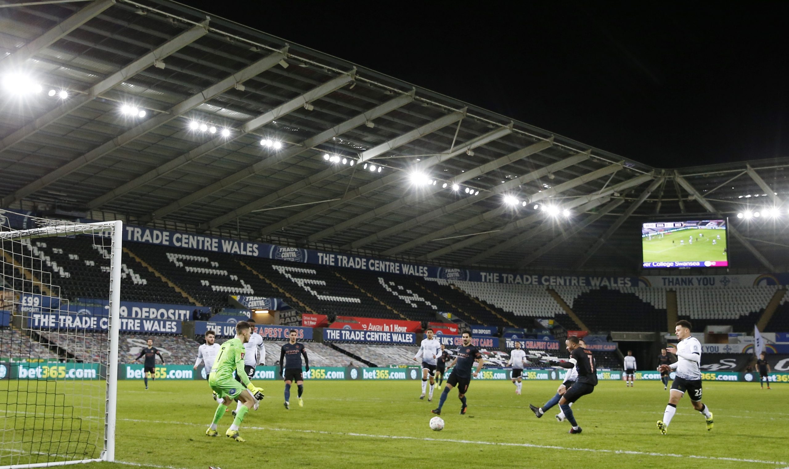 FA Cup - Fifth Round - Swansea City v Manchester City Soccer Football -  FA Cup - Fifth Round - Swansea City v Manchester City - Liberty Stadium, Swansea, Wales, Britain - February 10, 2021  Manchester City's Raheem Sterling scores their second goal Action Images via Reuters/Paul Childs PAUL CHILDS