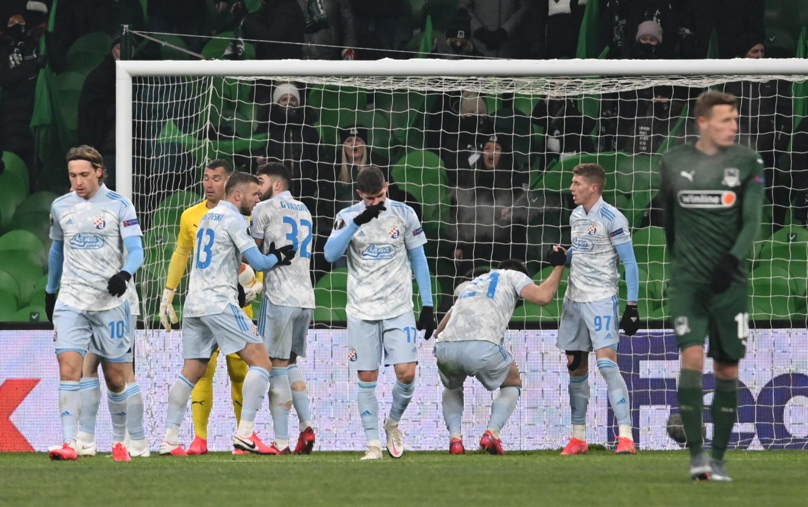 Europa League - Round of 32 First Leg - Krasnodar v Dinamo Zagreb Soccer Football - Europa League - Round of 32 First Leg - Krasnodar v Dinamo Zagreb - Krasnodar Stadium, Krasnodar, Russia - February 18, 2021 GNK Dinamo Zagreb's Bruno Petkovic celebrates scoring their first goal with teammates REUTERS/Sergey Pivovarov SERGEY PIVOVAROV